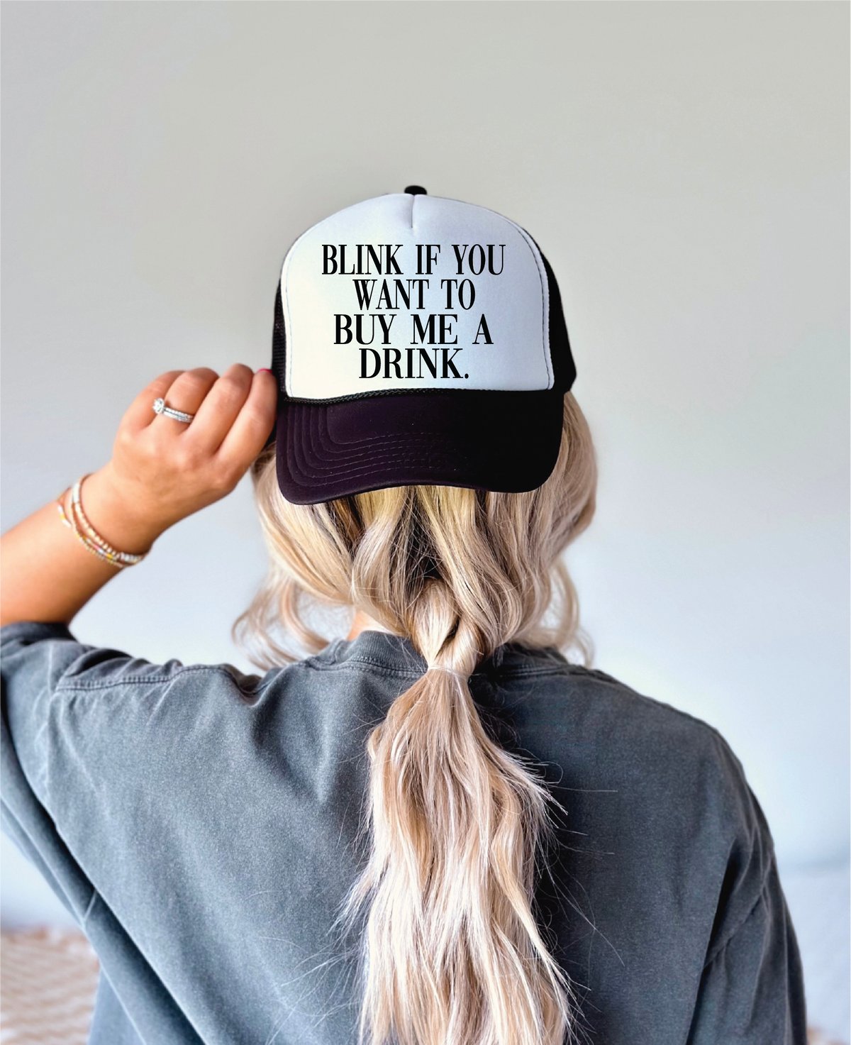 Blink If You Want To Buy Me A Drink DTF Printed Black and White Trucker Hat