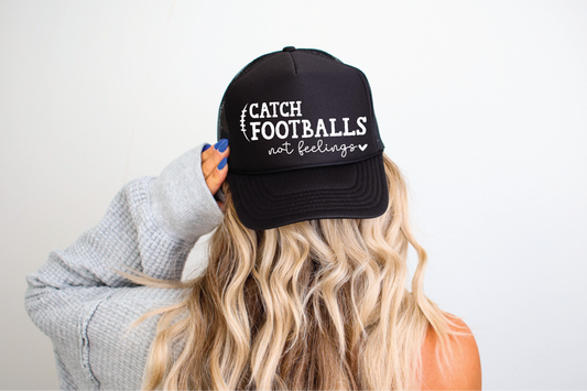 Catch Footballs Not Feelings DTF Printed Black Trucker Hat