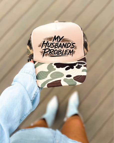 My Husbands Problem DTF Printed on A Duck Camo and Tan Trucker Hat