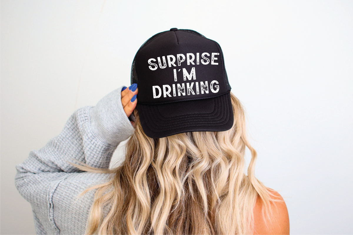 Surprise I'm Drinking DTF Printed Black Trucker Hat